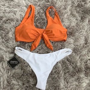 NWT bikini. Burnt orange top, white bottoms Size 6